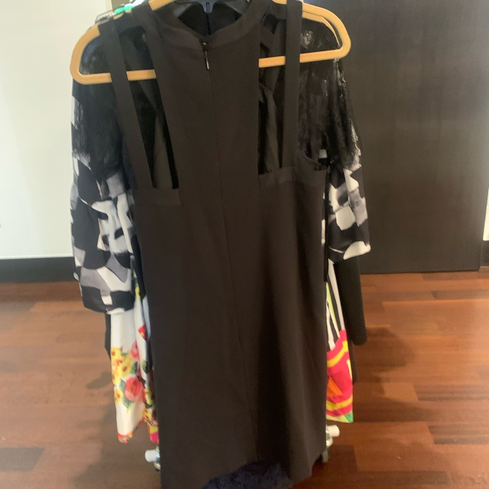 Selling a dress from BCBGMAXAZRIA. Color is black and comes in a size M